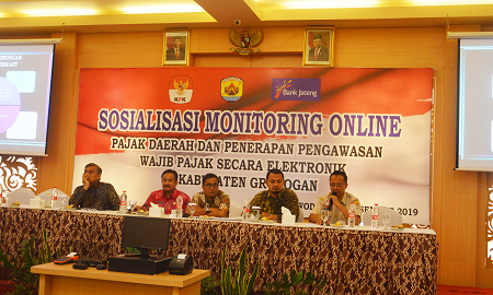 SOSIALISASI MONITORING PAJAK ONLINE DAN PENYERAHAN MOBIL PELAYANAN PAJAK DAERAH